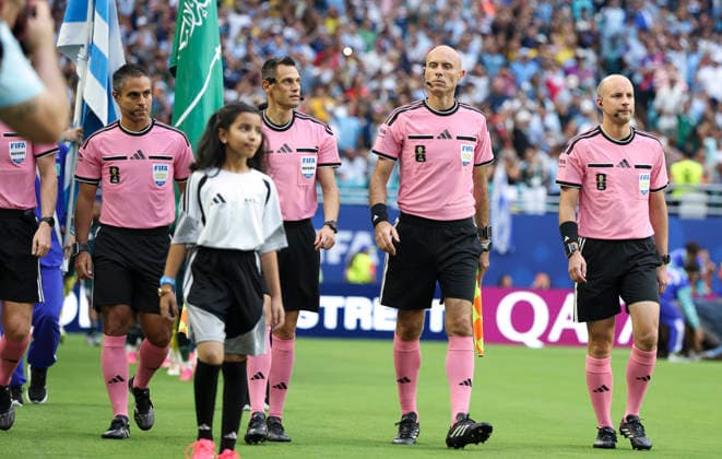 (260616) -- MIAMI, June 16, 2026 -- Referees walk into the court before the group H match between Saudi Arabia and Uruguay at the 2026 FIFA World Cup, WM, Weltmeisterschaft, Fussball at Miami Stadium, Miami, the United States, June 15, 2026. ) (SP)U.S.-MIAMI-FOOTBALL-FIFA WORLD CUP-GROUP H-KSA VS URU ZhangxChen 