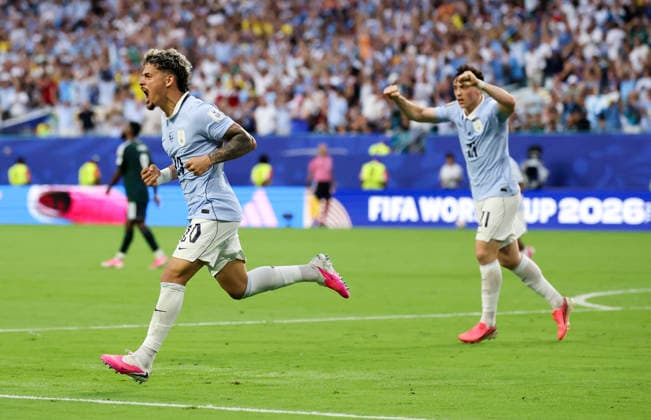 (260616) -- MIAMI, June 16, 2026 -- Maximilliano Araujo (L) of Uruguay celebrates his score during the group H match between Saudi Arabia and Uruguay at the 2026 FIFA World Cup, WM, Weltmeisterschaft, Fussball at Miami Stadium, Miami, the United States, June 15, 2026. ) (SP)U.S.-MIAMI-FOOTBALL-FIFA WORLD CUP-GROUP H-KSA VS URU ZhangxChen 