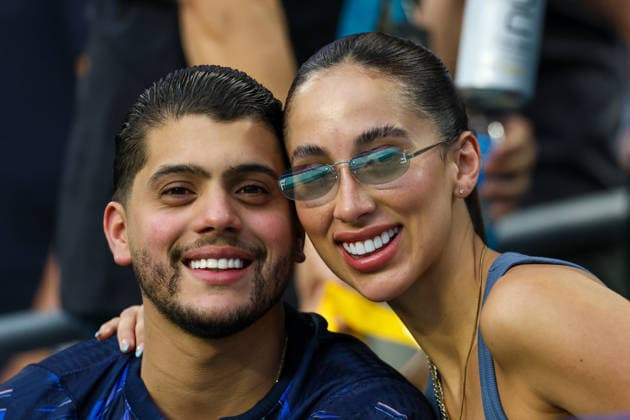 MIAMI GARDENS, FL - JUNE 15: Uruguay supporters pose for a photograph at a FIFA World Cup, WM, Weltmeisterschaft, Fussball 2026 Group H match between Saudi Arabia and Uruguay on June 15, 2026 at Miami Stadium, in Miami Gardens, Fla.(Photo by Chris Arjoon Icon Sportswire) SOCCER: JUN 15 FIFA World Cup 26 Group H - Saudi Arabia vs Uruguay EDITORIAL USE ONLY Icon26061500100064