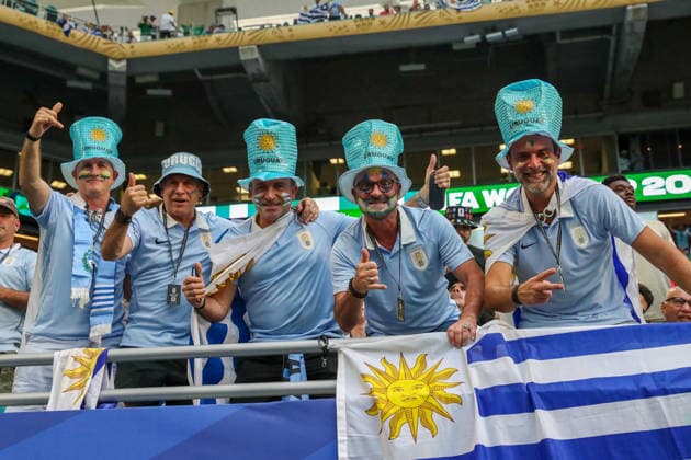 MIAMI GARDENS, FL - JUNE 15: Uruguay supporters pose for a photograph at a FIFA World Cup, WM, Weltmeisterschaft, Fussball 2026 Group H match between Saudi Arabia and Uruguay on June 15, 2026 at Miami Stadium, in Miami Gardens, Fla.(Photo by Chris Arjoon Icon Sportswire) SOCCER: JUN 15 FIFA World Cup 26 Group H - Saudi Arabia vs Uruguay EDITORIAL USE ONLY Icon26061500100069