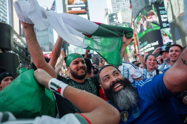 Soccer fans celebrate in Times Square ahead of FIFA World Cup, WM, Weltmeisterschaft, Fussball 2026 match Fans of Algerian and Argentine national soccer teams gather in Times Square one day before Argentina and Algeria teams face each other in Group 6 of FIFA World Cup, in New York, New York, USA, 15 June 2026. NEW YORK New York United States  Copyright: xOlgaxFedorovax