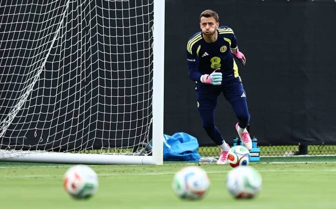 Angus Gunn of Scotland Scotland Training and press conference, PK, Pressekonferenz 2026 FIFA World Cup, WM, Weltmeisterschaft, Fussball Football, Atrium Health Performance Park, Charlotte, USA - 16 Jun 2026Charlotte Atrium Health Performance Park United States of America EDITORIAL USE ONLY No use with unauthorised audio, video, data, fixture lists, club league logos or live services. Online in-match use limited to 120 images, no video emulation. No use in betting, games or single club league player publications.  Copyright: xMichaelxZemanek Shutterstockx 16928907w