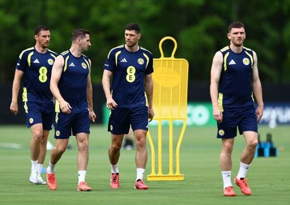 Scott McKenna and Kenny McLean of Scotland Scotland Training and press conference, PK, Pressekonferenz 2026 FIFA World Cup, WM, Weltmeisterschaft, Fussball Football, Atrium Health Performance Park, Charlotte, USA - 16 Jun 2026Charlotte Atrium Health Performance Park United States of America EDITORIAL USE ONLY No use with unauthorised audio, video, data, fixture lists, club league logos or live services. Online in-match use limited to 120 images, no video emulation. No use in betting, games or single club league player publications.  Copyright: xMichaelxZemanek Shutterstockx 16928907bb
