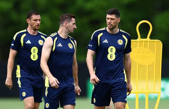 Scott McKenna and Kenny McLean of Scotland Scotland Training and press conference, PK, Pressekonferenz 2026 FIFA World Cup, WM, Weltmeisterschaft, Fussball Football, Atrium Health Performance Park, Charlotte, USA - 16 Jun 2026Charlotte Atrium Health Performance Park United States of America EDITORIAL USE ONLY No use with unauthorised audio, video, data, fixture lists, club league logos or live services. Online in-match use limited to 120 images, no video emulation. No use in betting, games or single club league player publications.  Copyright: xMichaelxZemanek Shutterstockx 16928907bd