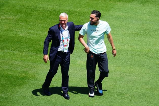 Didier Deschamps and Rayan Cherki of France ahead of kick-off France v Senegal, 2026 FIFA World Cup, WM, Weltmeisterschaft, Fussball Group I, Football, New York New Jersey Stadium, East Rutherford, New Jersey, USA - 16 Jun 2026East Rutherford New York New Jersey Stadium New Jersey (NJ) United States of America EDITORIAL USE ONLY No use with unauthorised audio, video, data, fixture lists, club league logos or live services. Online in-match use limited to 120 images, no video emulation. No use in betting, games or single club league player publications.  Copyright: xJavierxGarcia Shutterstockx 16928918g
