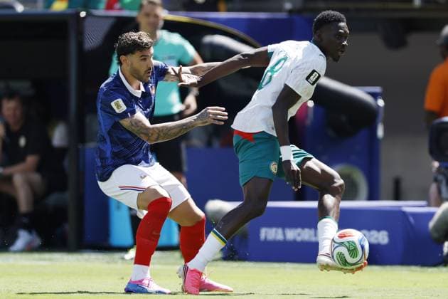 NEW JERSEY - (LR) Theo Hernandez of France, Lamine Camara of Senegal during the 2026 FIFA World Cup, WM, Weltmeisterschaft, Fussball Group I match between France and Senegal at the New Jersey Stadium on June 16, 2026, in New Jersey, United States. MAURICE VAN STEEN ANP FIFA World Cup 2026 2026 xVIxANPxSportx xMauricexvanxSteenxIVx 561188580 originalFilename: 561188580.jpg