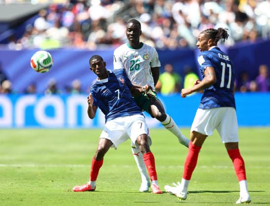 New Jersey, USA, 16th June 2026. Ousmane Dembele of France with Pape Gueye of Senegal during the France vs Senegal FIFA World Cup, WM, Weltmeisterschaft, Fussball match at Metlife Stadium, New Jersey. Picture credit should read: Paul Terry Sportimage EDITORIAL USE ONLY. No use with unauthorised audio, video, data, fixture lists, club league logos or live services. Online in-match use limited to 120 images, no video emulation. No use in betting, games or single club league player publications. SPI_041_PT_France_Senegal SPI-4837-0041