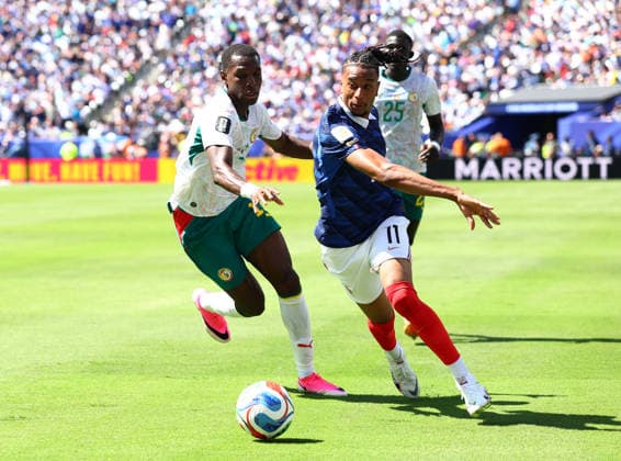 New Jersey, USA, 16th June 2026. Michael Olise of France with Nicolas Jackson of Senegal during the France vs Senegal FIFA World Cup, WM, Weltmeisterschaft, Fussball match at Metlife Stadium, New Jersey. Picture credit should read: Paul Terry Sportimage EDITORIAL USE ONLY. No use with unauthorised audio, video, data, fixture lists, club league logos or live services. Online in-match use limited to 120 images, no video emulation. No use in betting, games or single club league player publications. SPI_044_PT_France_Senegal SPI-4837-0044