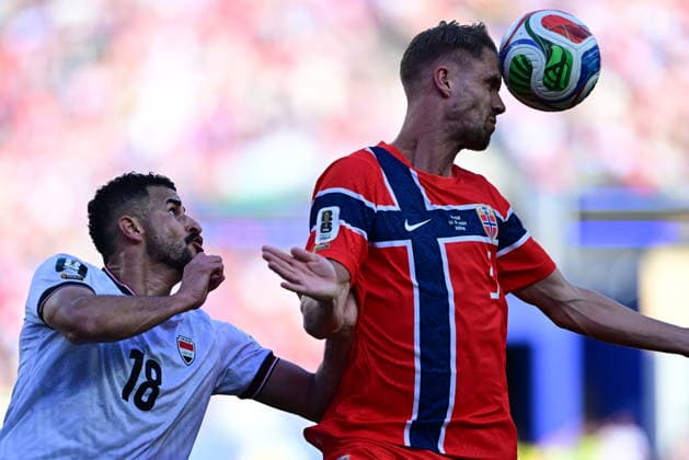 Iraq v Norway - FIFA World Cup, WM, Weltmeisterschaft, Fussball 2026 - Group I FOXBOROUGH, UNITED STATES - JUNE 16: Aymen Hussein (18) of Iraq in action against Kristoffer Ajer (3) of Norway during the 2026 FIFA World Cup First Stage Group I match between Iraq and Norway at Gillette Stadium (Boston Stadium) in Foxborough, Massachusetts, United States on June 16, 2026. Abdulhamid Hosbas Anadolu Massachusetts United States. Editorial use only. Please get in touch for any other usage.  Copyright: x2026xAnadoluxAbdulhamidxHosbasx