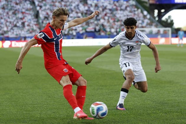 FIFA World Cup, WM, Weltmeisterschaft, Fussball 2026 - Group I - Iraq vs Norway Ali Jasim of Iraq (R) in action against Martin Odegaard of Norway (L) during the FIFA World Cup 2026 group stage match Iraq against Norway, in Boston, Massachusetts, USA, 16 June 2026. Foxborough United States  Copyright: xGREGxM.xCOOPERx