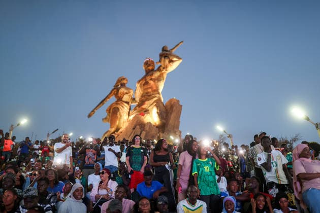 Senegal fans watch team s World Cup debut on giant screen DAKAR, SENEGAL - JUNE 16: Senegal fans watch their national team, Nationalteam s 2026 FIFA World Cup, WM, Weltmeisterschaft, Fussball Group I match against France on a giant screen set up at the African Renaissance Monument in Dakar, Senegal, on June 16, 2026. Hundreds of supporters gathered at the square ahead of kickoff, waving Senegalese flags and wearing national team jerseys as they followed the match. Cem Ozdel Anadolu Dakar Senegal. Editorial use only. Please get in touch for any other usage.  Copyright: x2026xAnadoluxCemxOzdelx