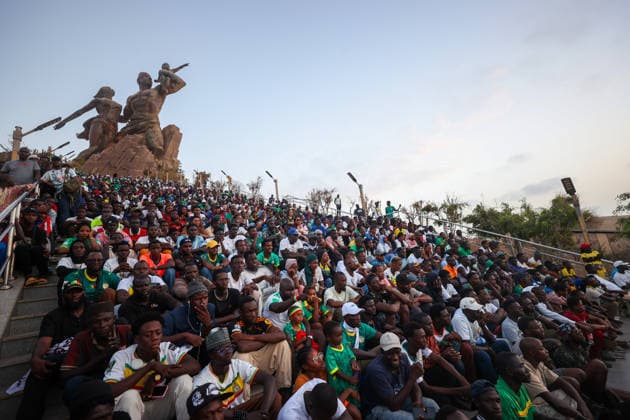 Senegal fans watch team s World Cup debut on giant screen DAKAR, SENEGAL - JUNE 16: Senegal fans watch their national team, Nationalteam s 2026 FIFA World Cup, WM, Weltmeisterschaft, Fussball Group I match against France on a giant screen set up at the African Renaissance Monument in Dakar, Senegal, on June 16, 2026. Hundreds of supporters gathered at the square ahead of kickoff, waving Senegalese flags and wearing national team jerseys as they followed the match. Cem Ozdel Anadolu Dakar Senegal. Editorial use only. Please get in touch for any other usage.  Copyright: x2026xAnadoluxCemxOzdelx