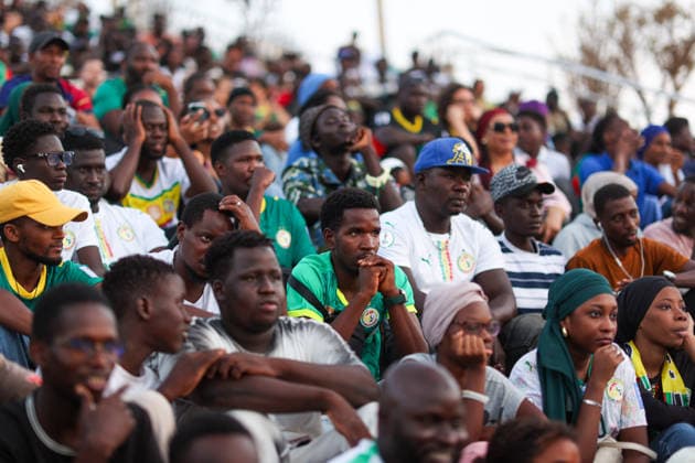 Senegal fans watch team s World Cup debut on giant screen DAKAR, SENEGAL - JUNE 16: Senegal fans watch their national team, Nationalteam s 2026 FIFA World Cup, WM, Weltmeisterschaft, Fussball Group I match against France on a giant screen set up at the African Renaissance Monument in Dakar, Senegal, on June 16, 2026. Hundreds of supporters gathered at the square ahead of kickoff, waving Senegalese flags and wearing national team jerseys as they followed the match. Cem Ozdel Anadolu Dakar Senegal. Editorial use only. Please get in touch for any other usage.  Copyright: x2026xAnadoluxCemxOzdelx