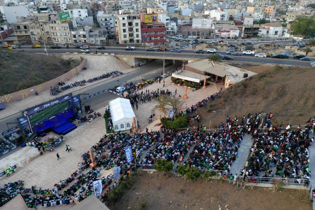 Senegal fans watch team s World Cup debut on giant screen DAKAR, SENEGAL - JUNE 16: Senegal fans watch their national team, Nationalteam s 2026 FIFA World Cup, WM, Weltmeisterschaft, Fussball Group I match against France on a giant screen set up at the African Renaissance Monument in Dakar, Senegal, on June 16, 2026. Hundreds of supporters gathered at the square ahead of kickoff, waving Senegalese flags and wearing national team jerseys as they followed the match. Cem Ozdel Anadolu Dakar Senegal. Editorial use only. Please get in touch for any other usage.  Copyright: x2026xAnadoluxCemxOzdelx
