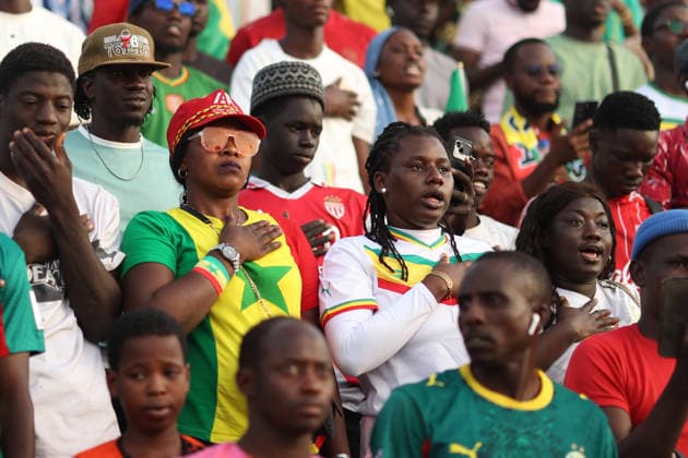 Senegal fans watch team s World Cup debut on giant screen DAKAR, SENEGAL - JUNE 16: Senegal fans watch their national team, Nationalteam s 2026 FIFA World Cup, WM, Weltmeisterschaft, Fussball Group I match against France on a giant screen set up at the African Renaissance Monument in Dakar, Senegal, on June 16, 2026. Hundreds of supporters gathered at the square ahead of kickoff, waving Senegalese flags and wearing national team jerseys as they followed the match. Cem Ozdel Anadolu Dakar Senegal. Editorial use only. Please get in touch for any other usage.  Copyright: x2026xAnadoluxCemxOzdelx