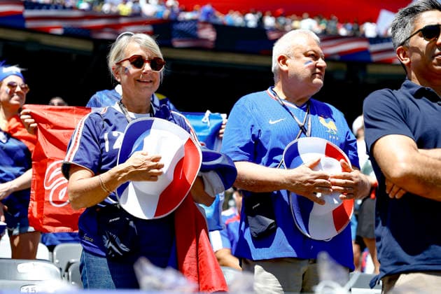 June 16, 2026: Before the game, Two France fans stand up for the national anthem in a FIFA World Cup, WM, Weltmeisterschaft, Fussball match at MetLife Stadium in East Rutherford, NJ. France defeats Senegal 3 -1. Cal Media Fifa World Cup 2026: France Vs Senegal JUN 16  - ZUMAc04_ 20260616_faf_c04_093 Copyright: xShaquanxWoodyx
