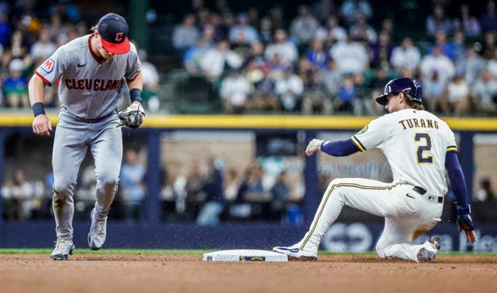 Cleveland Guardians second baseman Travis Bazzana forces out Milwaukee Brewers second baseman Brice Turang (R) on a ground ball hit by Milwaukee Brewers catcher William Contreras in the first inning of the MLB, Baseball Herren, USA game between the Cleveland Guardians and the Milwaukee Brewers at American Family Field in Milwaukee, Wisconsin on Tuesday, June 16, 2026.  MIL20260616804 TANNENxMAURY