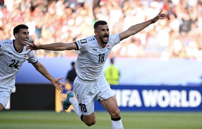 (260617) -- BOSTON, June 17, 2026 -- Aymen Hussein (R) of Iraq reacts after his score during the group I match between Norway and Iraq at the FIFA World Cup, WM, Weltmeisterschaft, Fussball 2026 at Boston Stadium in Boston, the United States, June 16, 2026. ) (SP)U.S.-BOSTON-FOOTBALL-FIFA WORLD CUP-GROUP I-NOR VS IRQ ChenxYichen 