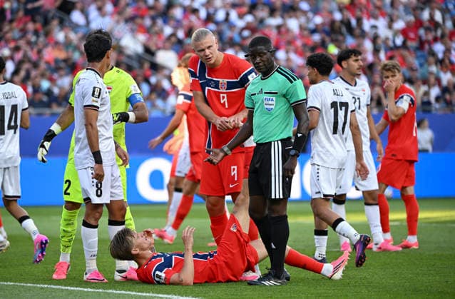 (260617) -- BOSTON, June 17, 2026 -- Erling Haaland (No. 9) of Norway communicates with referee Pierre Atcho about teammate David Moller Wolfe (bottom) during the group I match between Norway and Iraq at the FIFA World Cup, WM, Weltmeisterschaft, Fussball 2026 at Boston Stadium in Boston, the United States, June 16, 2026. ) (SP)U.S.-BOSTON-FOOTBALL-FIFA WORLD CUP-GROUP I-NOR VS IRQ ChenxYichen 