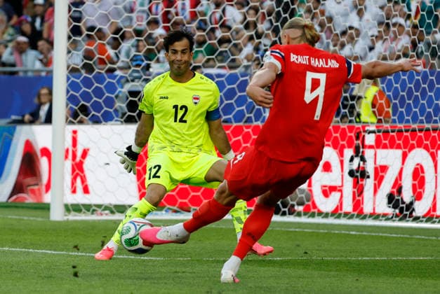 FOXBOROUGH, MA - JUNE 16: Erling Haaland 9 of Norway laces a shot at Jalal Hassan 12 of Iraq during a FIFA World Cup, WM, Weltmeisterschaft, Fussball 2026 Group I match between Iraq and Norway on June 16, 2026 at Boston Stadium in Foxborough, Massachusetts. (Photo by Fred Kfoury III Icon Sportswire) SOCCER: JUN 16 FIFA World Cup 26 Group I - Iraq vs Norway EDITORIAL USE ONLY Icon04787