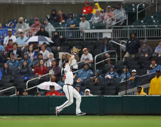Right fielder Mike Yastrzemski 18 of the Atlanta Braves catches a fly ball in the first inning against the San Francisco Giants at Truist Park on Tuesday, June 16, 2026 in Atlanta, Georgia.  ATL20260616111 MikexZarrilli