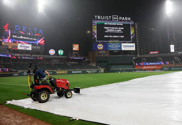 Detail of the outfield scoreboard noting that the game between the San Francisco Giants and the Atlanta Braves will resume on Wednesday, June 17, after rain at Truist Park on Tuesday, June 16, 2026 in Atlanta, Georgia.  ATL20260616112 MikexZarrilli
