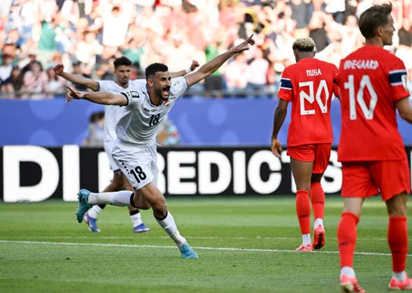 (260617) -- BOSTON, June 17, 2026 -- Aymen Hussein (2nd L) of Iraq reacts after his score during the group I match between Norway and Iraq at the FIFA World Cup, WM, Weltmeisterschaft, Fussball 2026 at Boston Stadium in Boston, the United States, June 16, 2026. ) (SP)U.S.-BOSTON-FOOTBALL-FIFA WORLD CUP-GROUP I-NOR VS IRQ ChenxYichen 