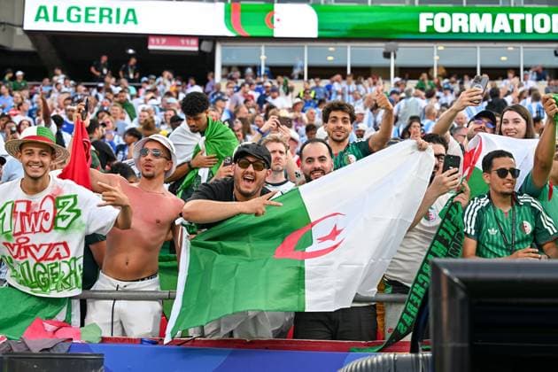 2026 World Cup - Argentina - Algeria KANSAS CITY, UNITED STATES JUNE 16, 2026: Algeria supporters display national flags and cheer from the stands ahead of the FIFA World Cup, WM, Weltmeisterschaft, Fussball 2026 Group J match between Algeria and Argentina at Kansas City Stadium in Kansas City, United States, on June 16, 2026. KANSAS CITY United States of America Copyright: x xwalidxibrahimx xJNAxPressx