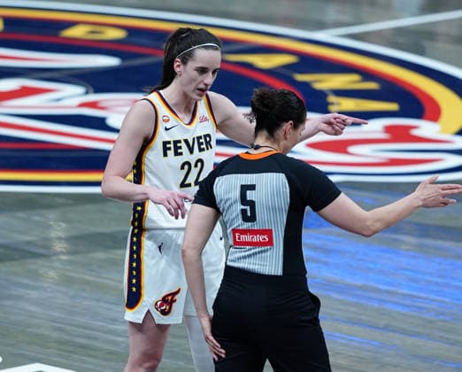 INDIANAPOLIS, IN - JUNE 16: Indiana Fever guard Caitlin Clark (22) talks to a referee during a game against the Toronto Tempo on June 16, 2026, at Gainbridge Fieldhouse in Indianapolis, Indiana. (Photo by Brian Spurlock Icon Sportswire) WNBA, Basketball Damen, USA JUN 16 Toronto Tempo at Indiana Fever EDITORIAL USE ONLY Icon26061642