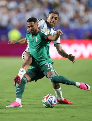 (260617) -- KANSAS CITY, June 17, 2026 -- Riyad Mahrez (front) of Algeria competes during the group J match between Argentina and Algeria at the FIFA World Cup, WM, Weltmeisterschaft, Fussball 2026 at Kansas City Stadium in Kansas City, the United States, June 16, 2026. ) (SP)U.S.-KANSAS CITY-FOOTBALL-FIFA WORLD CUP-GROUP J-ARG VS ALG LixMing 