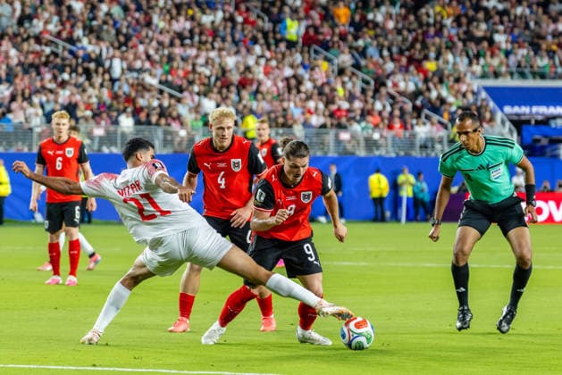 SANTA CLARA, CA - JUNE 16: Nizar al-Rashdan 21 of Jordan challenges Marcel Sabitzer 9 of Austria for the ball during the FIFA World Cup, WM, Weltmeisterschaft, Fussball 2026 Group J match between Austria and Jordan on June 16, 2026 at San Francisco Bay Area Stadium in Santa Clara, CA. (Photo by Matthew Huang Icon Sportswire) SOCCER: JUN 16 FIFA World Cup 26 Group J - Austria vs Jordan EDITORIAL USE ONLY Icon260616008