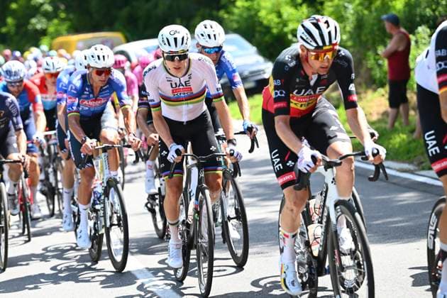 Tour de Suisse 2026 Stage 1 SONDRIO, ITALY - JUNE 17 : Wellens Tim (BEL) of UAE Team Emirates - XRG, Pogacar Tadej (SLO) of UAE Team Emirates - XRG, Van Der Poel Mathieu (NED) of Alpecin - Premier Tech during stage 1 of the 89th edition of Tour de Suisse an UCI World Tour 2.UWT cycling road race stage for Men Elite of 144 km with start in Sondrio and finish in Sondrio on June 17, 2026 in Sondrio, Italy, 17 06 2026 ( Motordriver Guy De Vuyst - Sondrio Italy  Copyright: xVincentxKalutx