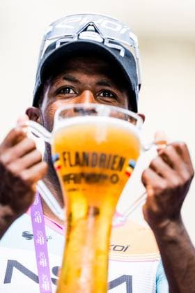 Eritrean Biniam Girmay of NSN Cycling Team celebrates on the podium after winning stage 1 of the Baloise Belgium Tour cycling race, 187,9 km with start and finish in Scherpenheuvel-Zichem, Wednesday 17 June 2026. The Baloise Belgium Tour takes place from 17 to 21 June. JASPERxJACOBS  x177947222x