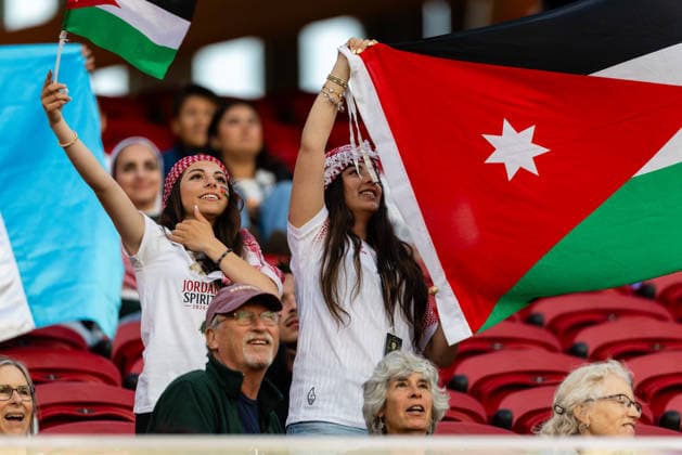 SANTA CLARA, CA - JUNE 16: Jordan fans hold up a flag before the FIFA World Cup, WM, Weltmeisterschaft, Fussball 2026 Group J match between Austria and Jordan on June 16, 2026 at San Francisco Bay Area Stadium in Santa Clara, CA. (Photo by Matthew Huang Icon Sportswire) SOCCER: JUN 16 FIFA World Cup 26 Group J - Austria vs Jordan EDITORIAL USE ONLY Icon260616049