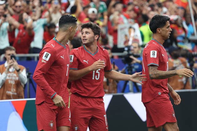 FIFA World Cup, WM, Weltmeisterschaft, Fussball 2026 - Group K - Portugal vs DR Congo Joao Neves (C) of Portugal celebrates with his teammate Cristiano Ronaldo (L) after scoring the 1-0 goal during the FIFA World Cup 2026 group stage match between Portugal and DR Congo, in Houston, Texas, USA, 17 June 2026. Houston United States  Copyright: xMIGUELxA.xLOPESx