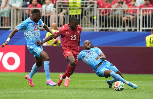 (260618) -- HOUSTON, June 18, 2026 -- Nuno Mendes (C) of Portugal breaks through during the group K match between Portugal and the Democratic Republic of the Congo (DRC) at the 2026 FIFA World Cup, WM, Weltmeisterschaft, Fussball at Houston Stadium in Houston, the United States, June 17, 2026. ) (SP)U.S.-HOUSTON-FOOTBALL-FIFA WORLD CUP-GROUP K-POR VS COD XiaoxYijiu 