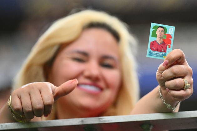 FIFA World Cup, WM, Weltmeisterschaft, Fussball 2026 - Group K - Portugal vs DR Congo epaselect A fans holds a sticker of Cristiano Ronaldo of Portugal during the FIFA World Cup 2026 group stage match Portugal against Democratic Republic of Congo, in Houston, USA, 17 June 2026. HOUSTON United States  Copyright: xSAMxWASSONx