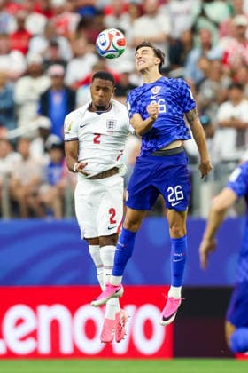 England v Croatia: Group L - FIFA World Cup, WM, Weltmeisterschaft, Fussball 2026 Ezri Konsa on England and Petar Musa of Croatia jumps for the ball during the FIFA World Cup 2026 Group L match between England and Croatia at Dallas Stadium on June 17, 2026 in Dallas, Texas.  SanjinxStrukic PIXSELL