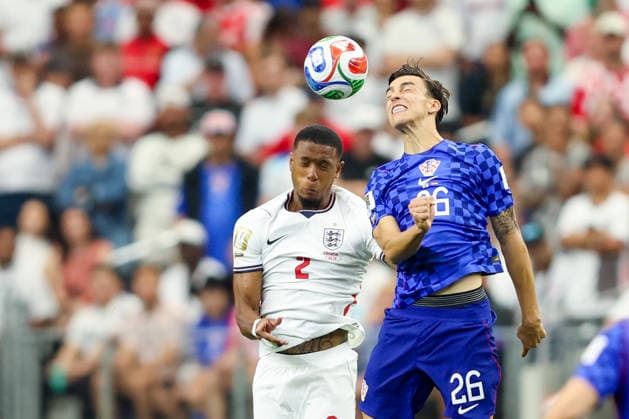 England v Croatia: Group L - FIFA World Cup, WM, Weltmeisterschaft, Fussball 2026 Ezri Konsa on England and Petar Musa of Croatia jumps for the ball during the FIFA World Cup 2026 Group L match between England and Croatia at Dallas Stadium on June 17, 2026 in Dallas, Texas.  SanjinxStrukic PIXSELL