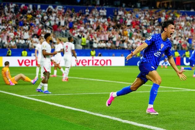 Petar Musa celebrates scoring for Croatia England v Croatia, 2026 FIFA World Cup, WM, Weltmeisterschaft, Fussball Group L, Football, Dallas Stadium, Arlington, Texas, USA - 17 Jun 2026Arlington Dallas Stadium Texas (TX) United States of America EDITORIAL USE ONLY No use with unauthorised audio, video, data, fixture lists, club league logos or live services. Online in-match use limited to 120 images, no video emulation. No use in betting, games or single club league player publications.  Copyright: xJavierxGarcia Shutterstockx 16928920cd