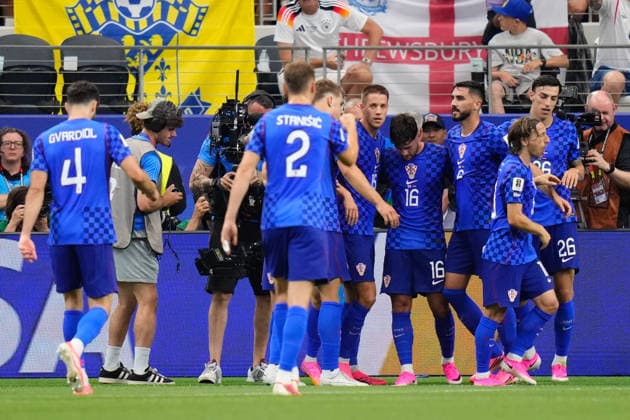 England v Croatia: Group L - FIFA World Cup, WM, Weltmeisterschaft, Fussball 2026 Martin Baturina of Croatia celebrates a goal with teammates during the FIFA World Cup 2026 Group L match between England and Croatia at Dallas Stadium on June 17, 2026 in Arlington, Texas. Arlington TX United States  Copyright: xJosexBretonx originalFilename:bretonhernandez-englandv260617_npra5.jpg
