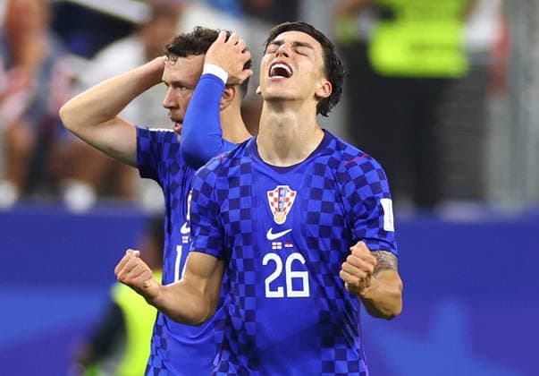 Croatia s Petar Musa celebrates after scoring a goal against England in the first half during a FIFA World Cup, WM, Weltmeisterschaft, Fussball match at AT&T Stadium in Dallas, Texas, on Wednesday, June 17, 2026.  DAL20260617915 CHRISTIANxBRUNSKILL