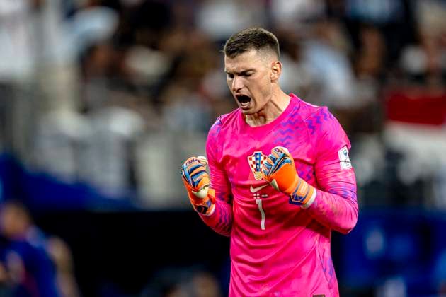 DALLAS - Croatia goalkeeper Dominik Livakovic celebrates the 2-2 during the 2026 World Cup at AT&T Stadium on June 17, 2026, in Dallas, United States. (Photo by Stefan Koops EYE4IMAGES DeFodi Images) -
