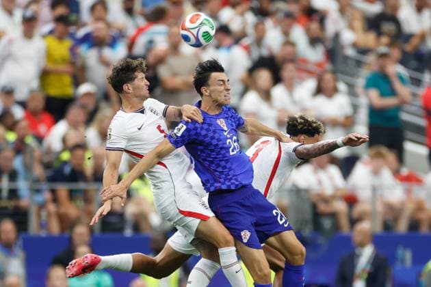DALLAS, 17-06-2026, Dallas AT&T Stadium, World Cup 2026 Match between England and Croatia. Picture shows England player John Stones, Croatia player Petar Musa, England player Nico Oreilly England - Croatia (World Cup 2026)  x204429844x Copyright: