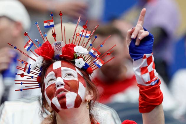 A female fan from Croatia cheers on the team before a Group L match at the 2026 FIFA World Cup, WM, Weltmeisterschaft, Fussball between England and Croatia at AT&T Stadium in Dallas, USA, 17 June 2026. FIFA World Cup 2026 - Group L - England vs Croatia !ACHTUNG: NUR REDAKTIONELLE NUTZUNG!  Copyright: xMariscalx GR3373 20260617-55020628017_1