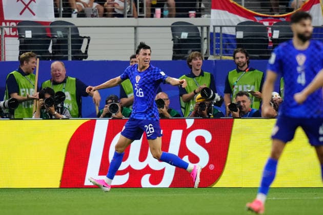 England v Croatia: Group L - FIFA World Cup, WM, Weltmeisterschaft, Fussball 2026 Petar Musa of Croatia celebrates a goal during the FIFA World Cup 2026 Group L match between England and Croatia at Dallas Stadium on June 17, 2026 in Arlington, Texas. Arlington TX United States  Copyright: xJosexBretonx originalFilename:bretonhernandez-englandv260617_np4Up.jpg