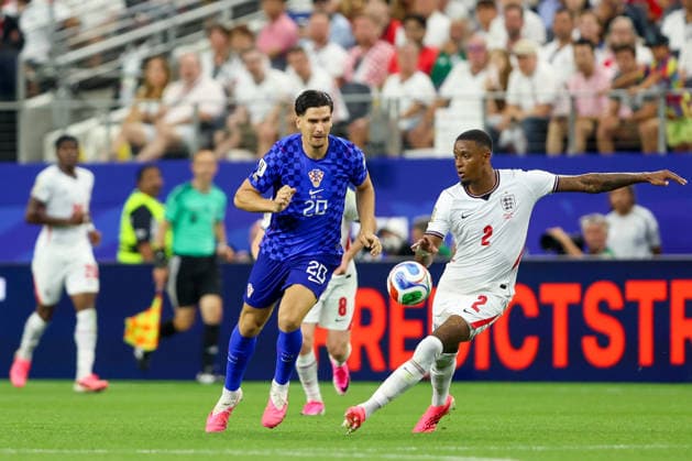 England v Croatia: Group L - FIFA World Cup, WM, Weltmeisterschaft, Fussball 2026 Igor Matanovic of Croatia and Ezri Konsa of England competes for the ball during the FIFA World Cup 2026 Group L match between England and Croatia at Dallas Stadium on June 17, 2026 in Dallas, Texas.  SanjinxStrukic PIXSELL