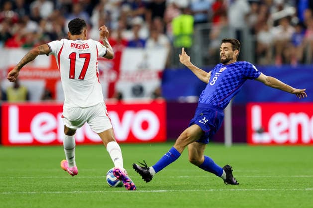England v Croatia: Group L - FIFA World Cup, WM, Weltmeisterschaft, Fussball 2026 Morgan Rogers of England and Mateo Kovacic of Croatia competes for the ball during the FIFA World Cup 2026 Group L match between England and Croatia at Dallas Stadium on June 17, 2026 in Dallas, Texas.  SanjinxStrukic PIXSELL
