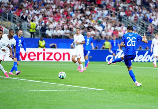 (260618) -- DALLAS, June 18, 2026 -- Petar Musa (1st R) of Croatia shoots and scores during the group L match between England and Croatia at the 2026 FIFA World Cup, WM, Weltmeisterschaft, Fussball at the Dallas Stadium in Dallas, the United States, on June 17, 2026. ) (SP)U.S.-DALLAS-FOOTBALL-FIFA WORLD CUP-GROUP L-ENG VS CRO JiaxHaocheng 