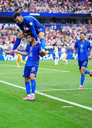 (260618) -- DALLAS, June 18, 2026 -- Martin Baturina (No. 16) of Croatia celebrates his goal during the group L match between England and Croatia at the 2026 FIFA World Cup, WM, Weltmeisterschaft, Fussball at the Dallas Stadium in Dallas, the United States, on June 17, 2026. ) (SP)U.S.-DALLAS-FOOTBALL-FIFA WORLD CUP-GROUP L-ENG VS CRO JiaxHaocheng 